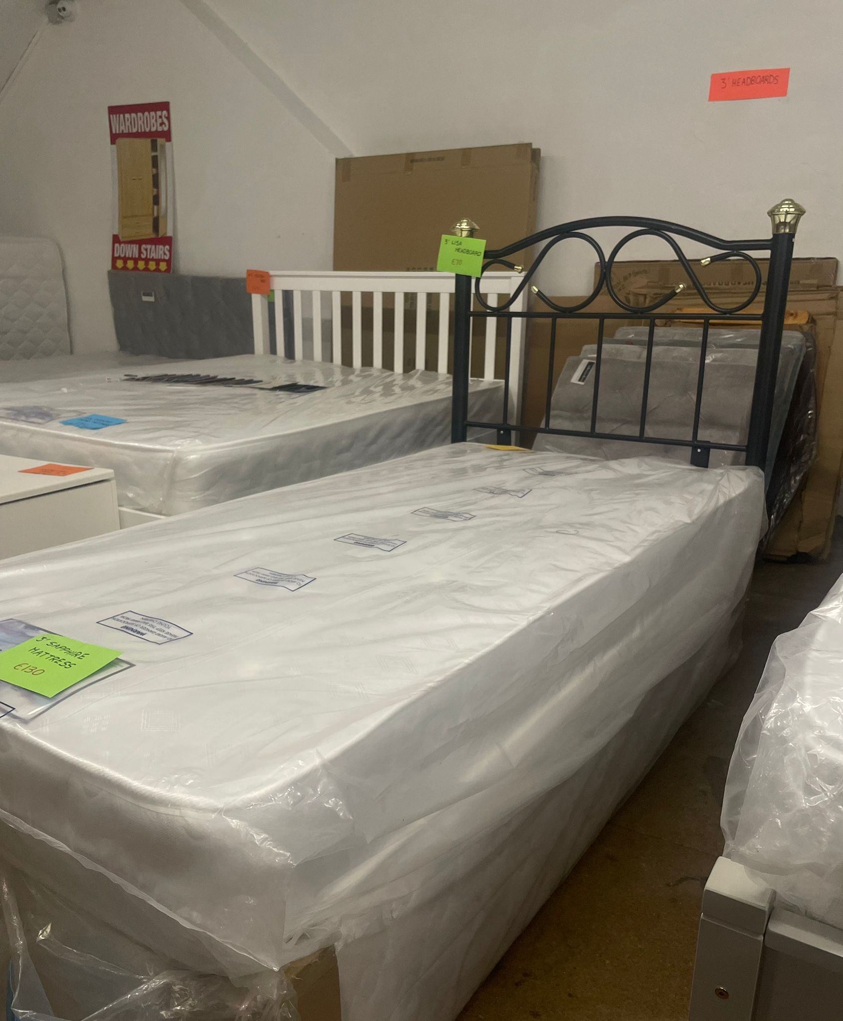 Beds on display in store